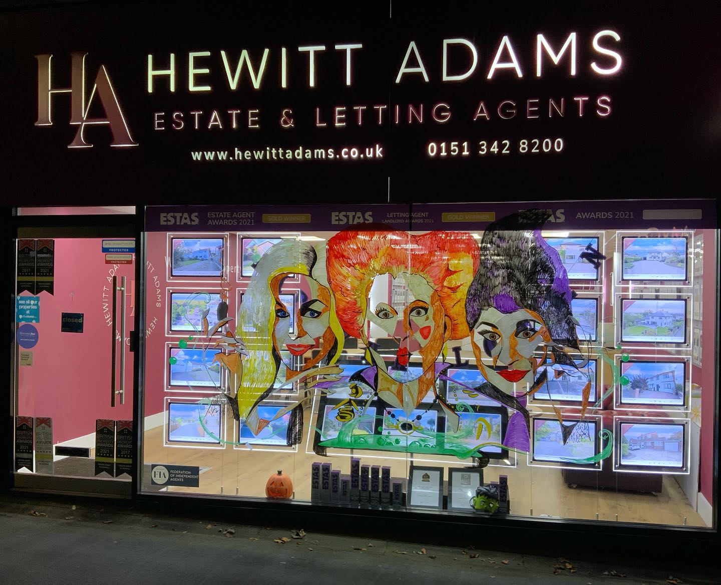 Hand-painted seasonal window display for a local Wirral business